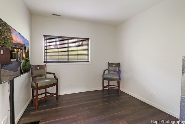 living area featuring dark hardwood / wood-style flooring