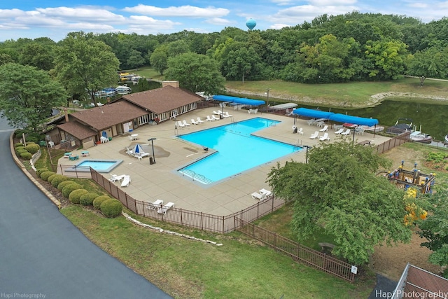 view of swimming pool with a patio area