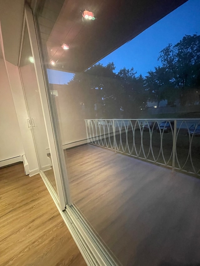 view of balcony at twilight