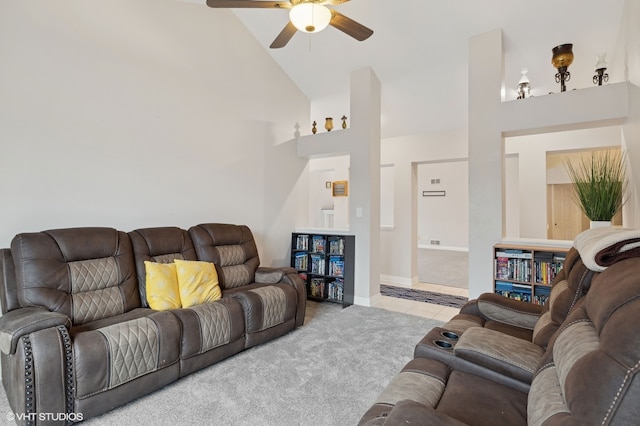 living room featuring light carpet, high vaulted ceiling, and ceiling fan