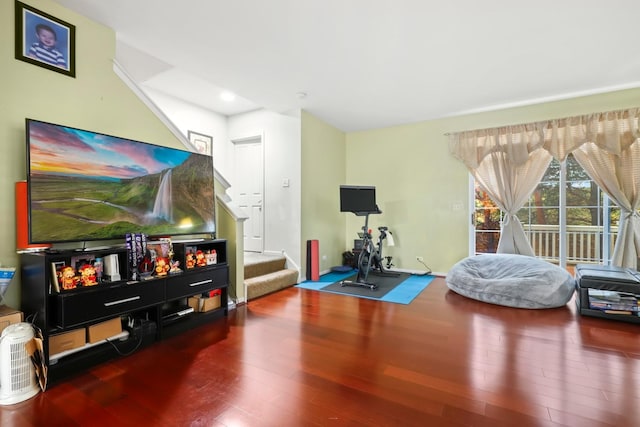 exercise room with hardwood / wood-style floors