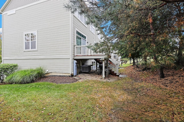 view of home's exterior with a lawn