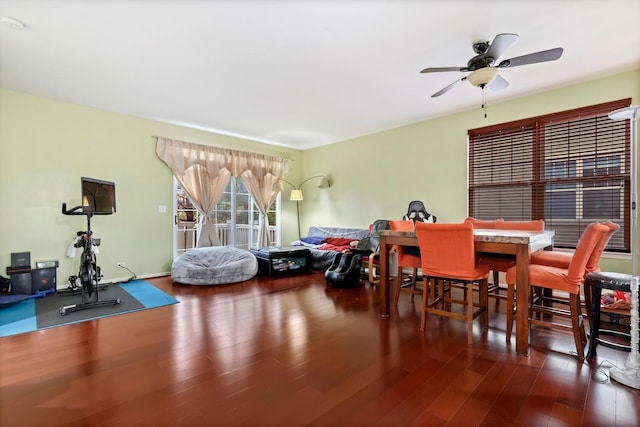 dining room featuring ceiling fan and wood-type flooring