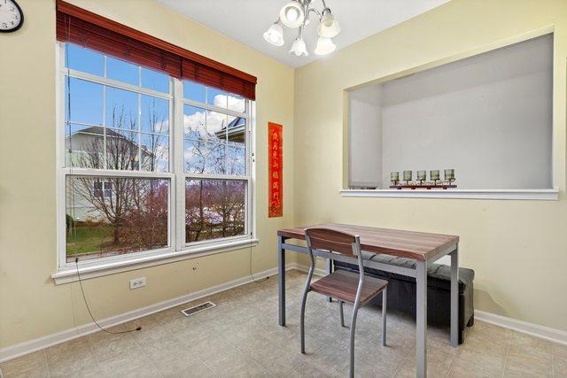 dining area with a chandelier