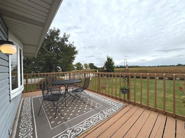 deck featuring a yard