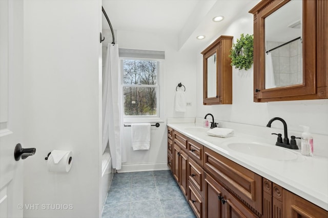 bathroom with vanity and shower / tub combo