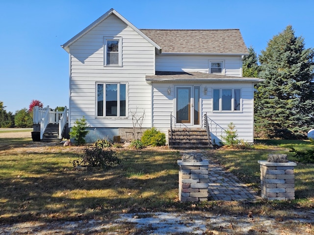 view of front of home featuring a front lawn