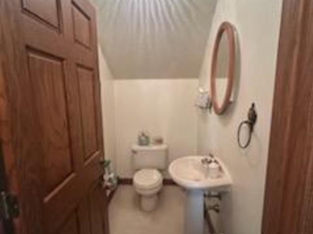 bathroom featuring toilet