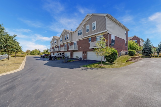 view of home's exterior with a garage