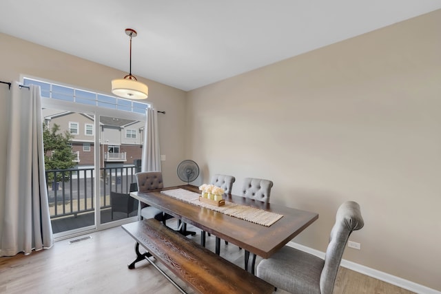 dining room featuring light hardwood / wood-style flooring