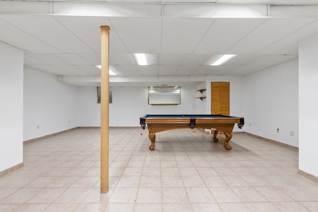 rec room featuring pool table, a paneled ceiling, and light tile patterned flooring