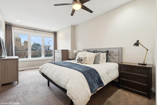 carpeted bedroom featuring ceiling fan