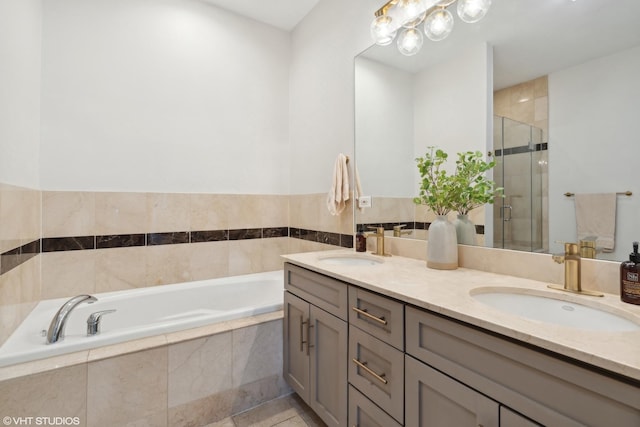 bathroom featuring separate shower and tub, tile patterned floors, and vanity