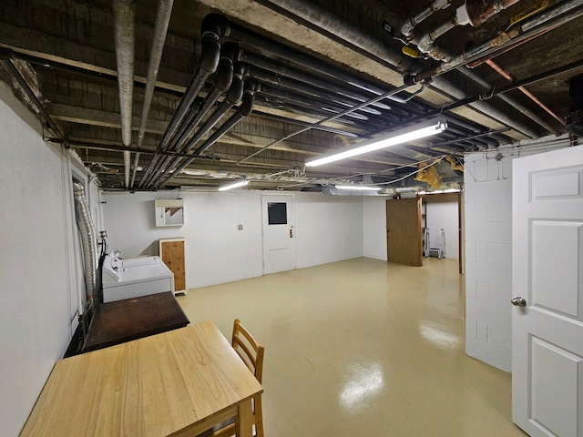 basement featuring washing machine and dryer