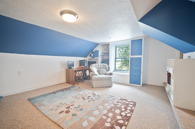 living area with carpet floors, a textured ceiling, and lofted ceiling