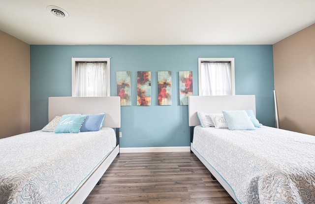 bedroom featuring dark hardwood / wood-style floors