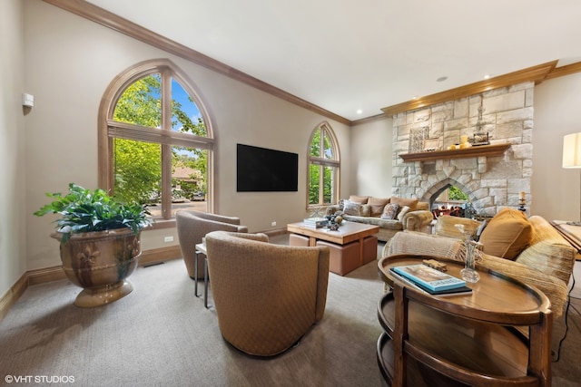 living room featuring a healthy amount of sunlight, a stone fireplace, crown molding, and light carpet