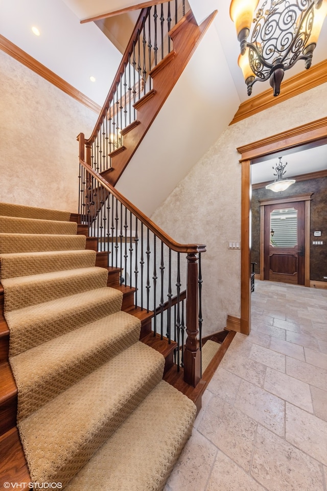 stairs featuring ornamental molding