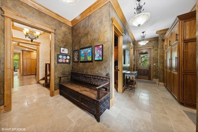 interior space with an inviting chandelier and crown molding