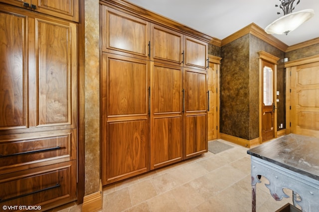 interior space featuring crown molding