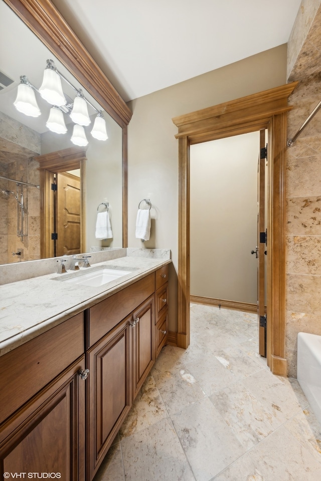 bathroom with independent shower and bath and vanity