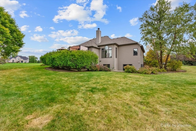 exterior space with a lawn