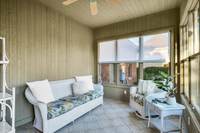 sunroom / solarium with ceiling fan and wooden ceiling