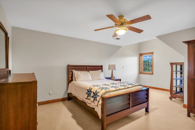 bedroom with light colored carpet and ceiling fan