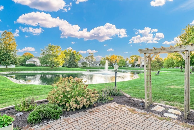 view of patio featuring a water view