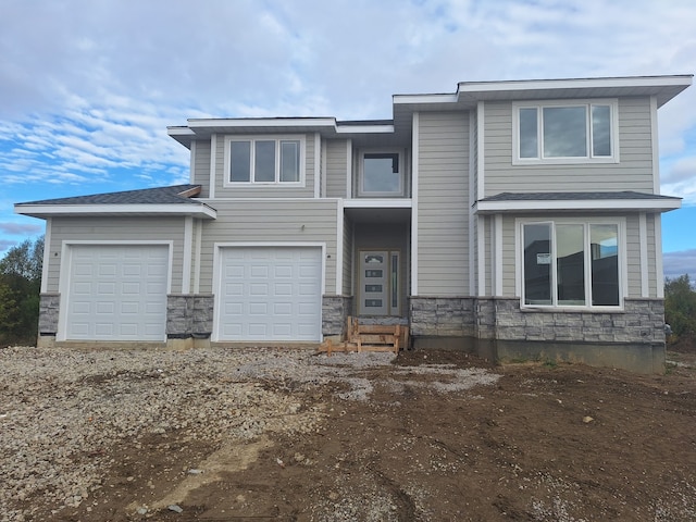 view of front of home featuring a garage