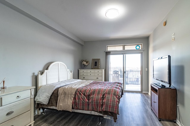 bedroom with dark hardwood / wood-style floors and access to exterior