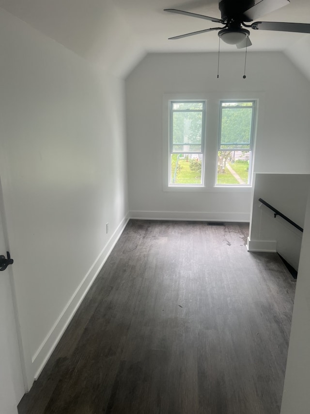 bonus room featuring ceiling fan, lofted ceiling, and dark hardwood / wood-style floors