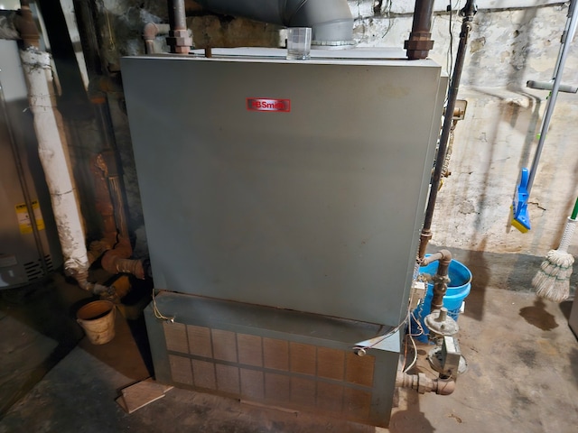 utilities featuring gas water heater and heating unit