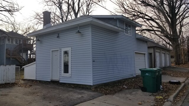 exterior space with a garage