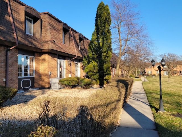 exterior space with a lawn