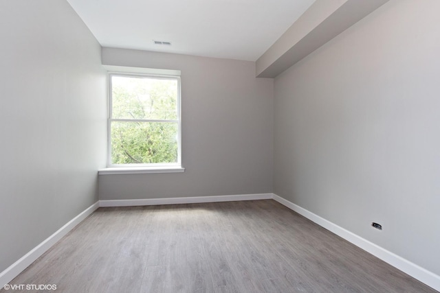 3544 W Douglas Blvd, Chicago, IL 60623 - unfurnished room with wood finished floors and baseboards