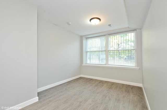 3544 W Douglas Blvd, Chicago, IL 60623 - spare room with wood finished floors and a smoke detector