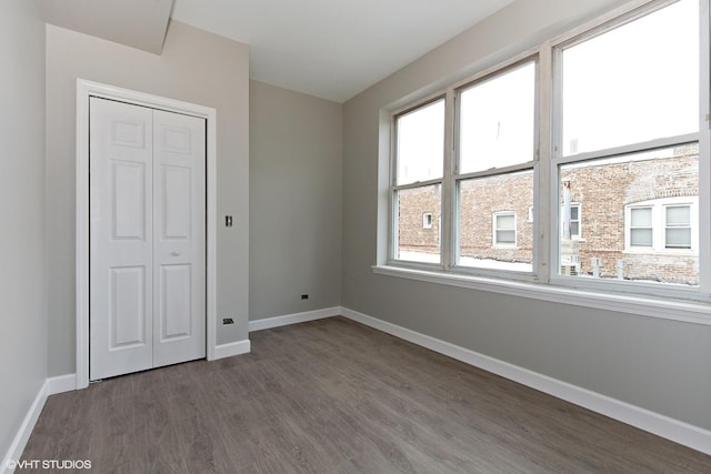 3544 W Douglas Blvd, Chicago, IL 60623 - unfurnished bedroom with wood finished floors and a closet