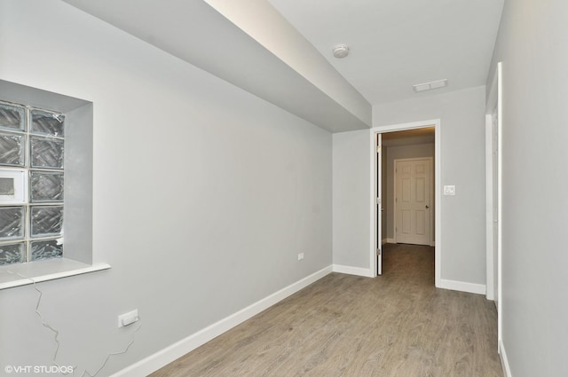 3544 W Douglas Blvd, Chicago, IL 60623 - unfurnished room featuring light wood-style flooring and a smoke detector