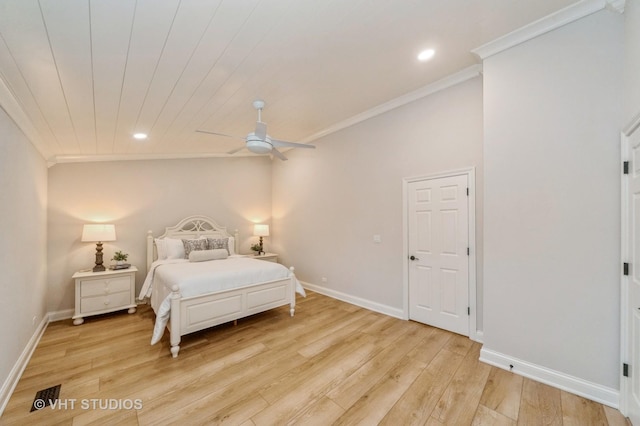 bedroom featuring light hardwood / wood-style flooring, ceiling fan, ornamental molding, and wood ceiling