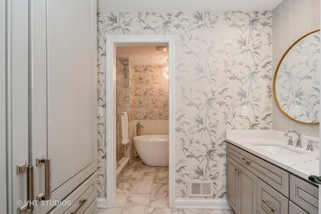 bathroom featuring a bathtub and vanity