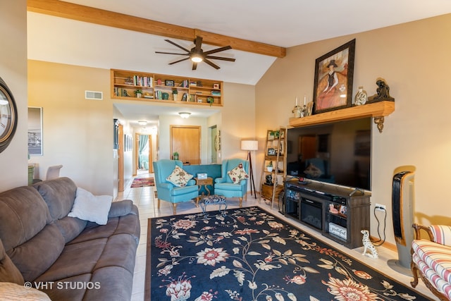 living room with vaulted ceiling with beams, ceiling fan, and tile patterned floors