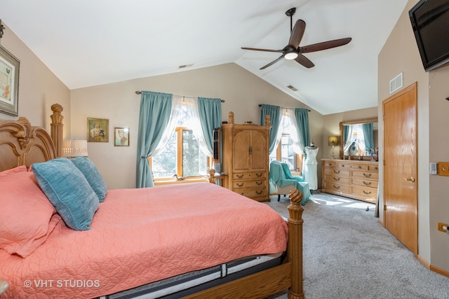 carpeted bedroom featuring vaulted ceiling, ceiling fan, and multiple windows