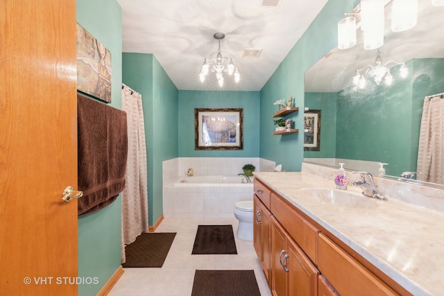 bathroom featuring vanity, tile patterned flooring, an inviting chandelier, a relaxing tiled tub, and toilet