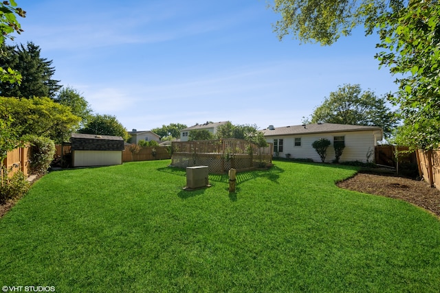 view of yard with a storage shed