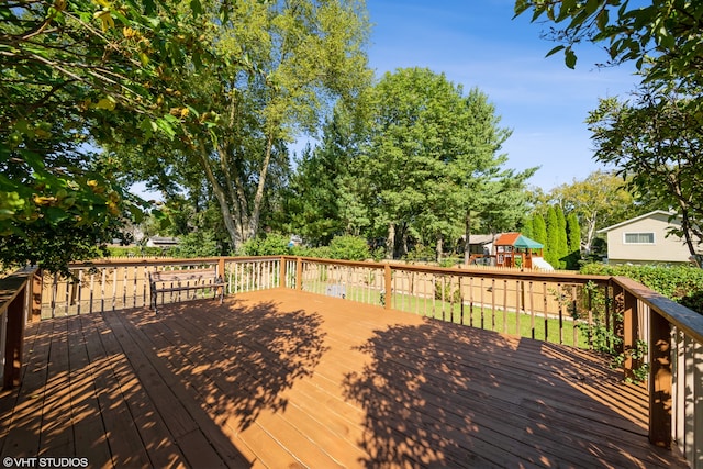 wooden deck with a playground