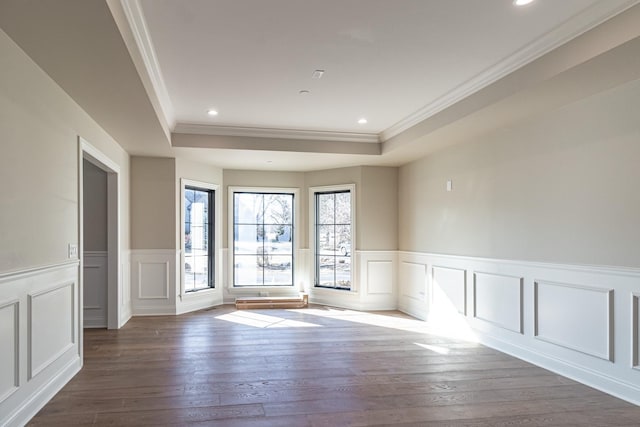 4463 Kettering Dr, Long Grove, IL 60047 - spare room with ornamental molding, a decorative wall, hardwood / wood-style floors, a raised ceiling, and wainscoting
