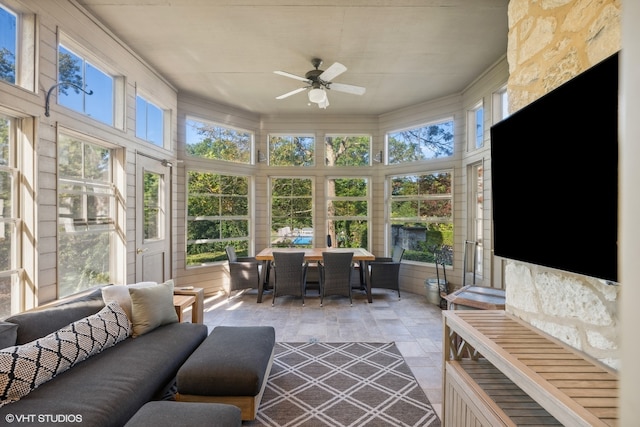 sunroom / solarium with ceiling fan