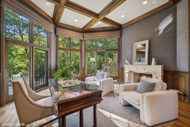 sunroom featuring beam ceiling and coffered ceiling