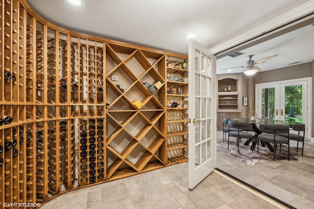 wine room with french doors and ceiling fan